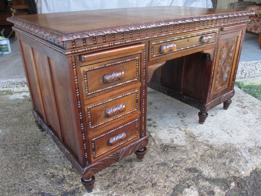 Carved Brazilian mahogany pedestal desk  View II