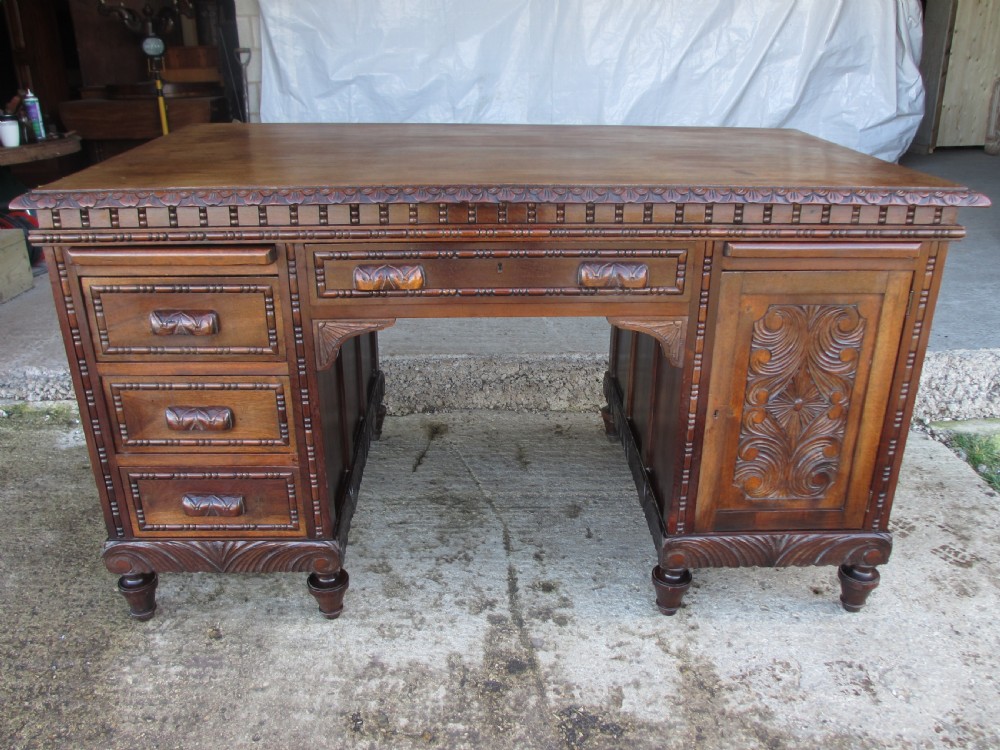 Carved Brazilian mahogany pedestal desk  View III