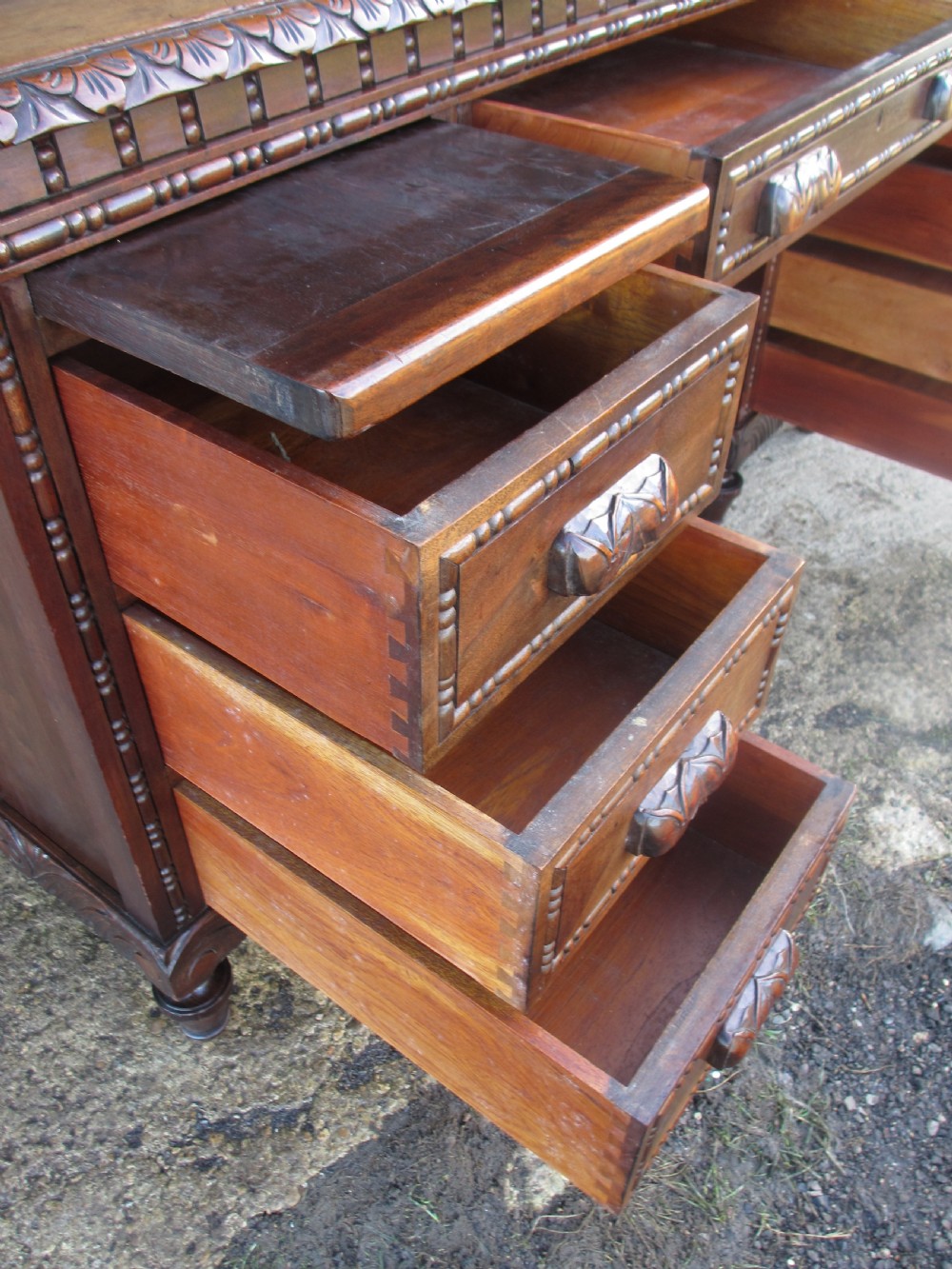 Carved Brazilian mahogany pedestal desk  View VIII