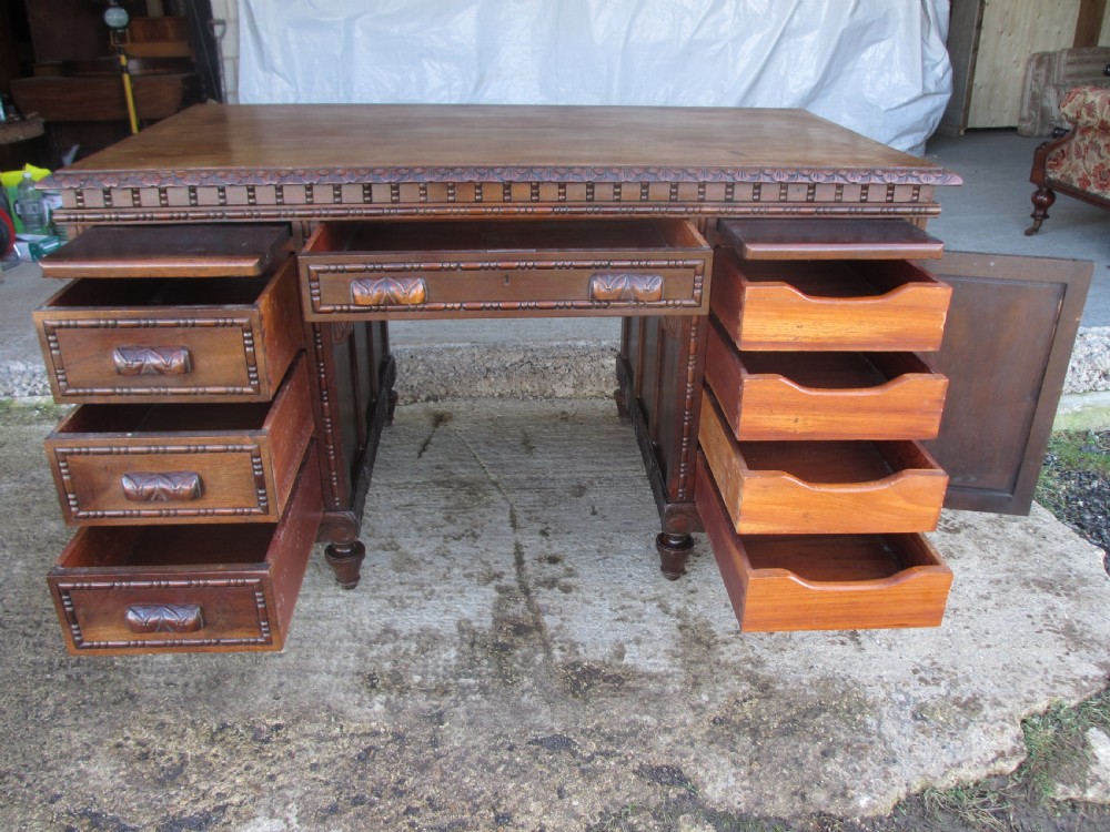 Carved Brazilian mahogany pedestal desk  View IX