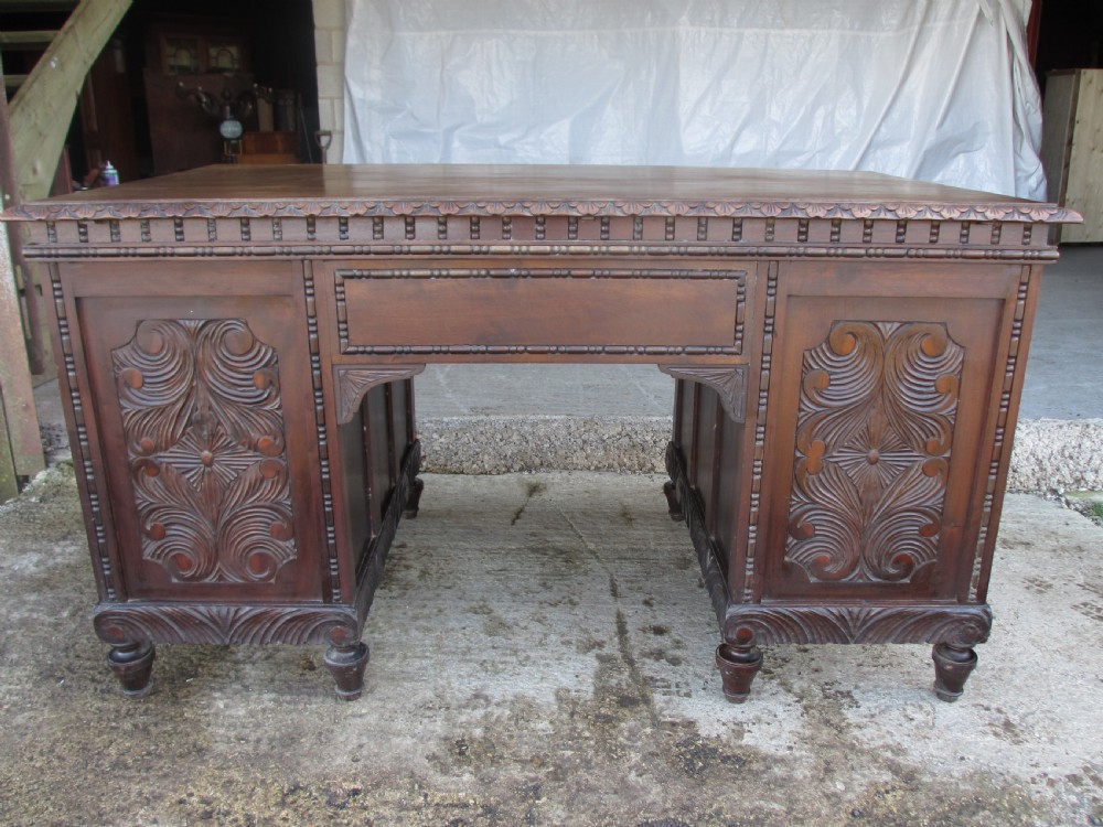 Carved Brazilian mahogany pedestal desk  View XI