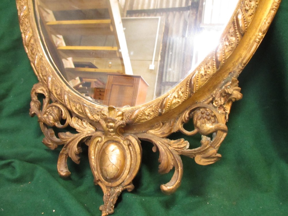 18th century gilt framed oval wall hanging mirror View III