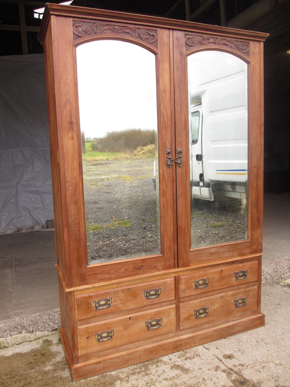 Victorian stripped carved mahogany twin arched bevel mirrored door wardrobe  View II