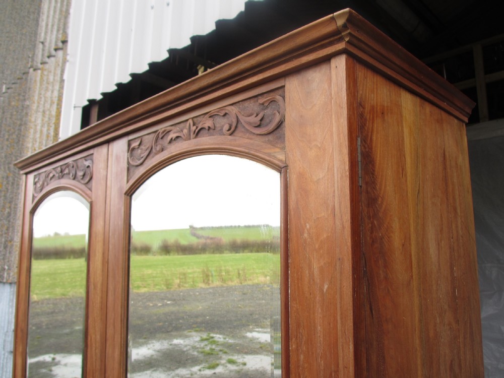Victorian stripped carved mahogany twin arched bevel mirrored door wardrobe  View IV