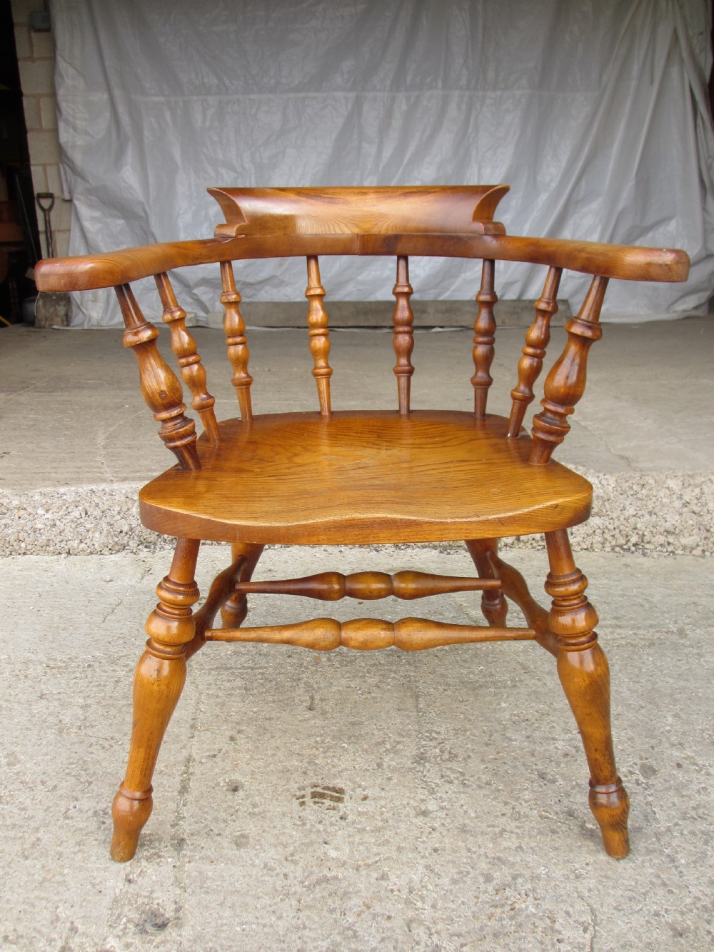 Pair of 19th century elm seated captain smokers bow arm chairs View III