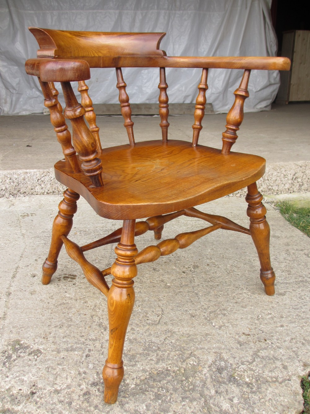 Pair of 19th century elm seated captain smokers bow arm chairs View IV