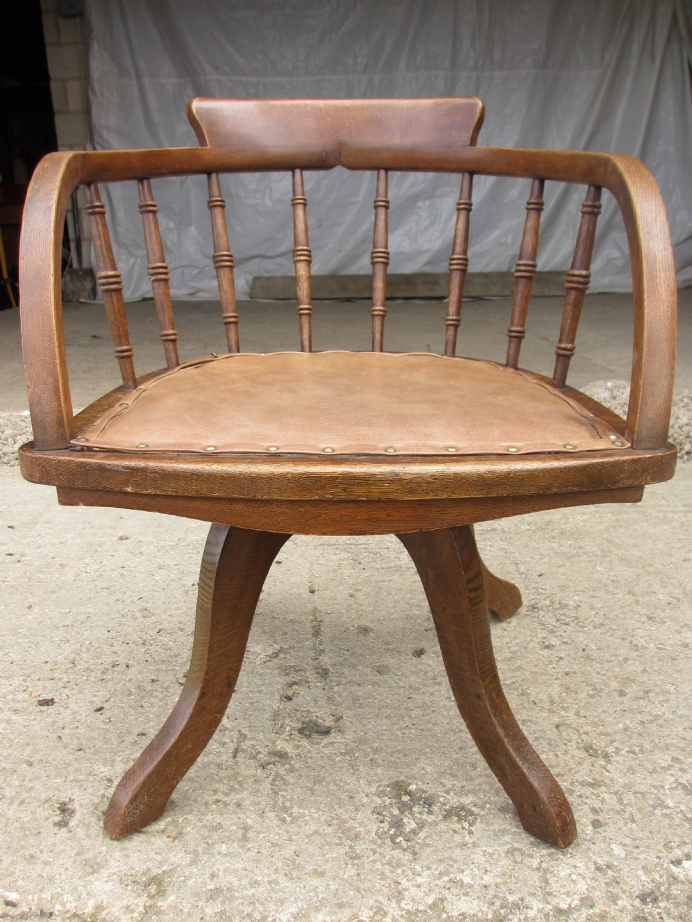 Edwardian oak spindle back swivel desk chair 