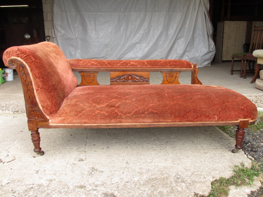Victorian carved mahogany upholstered chaise longue