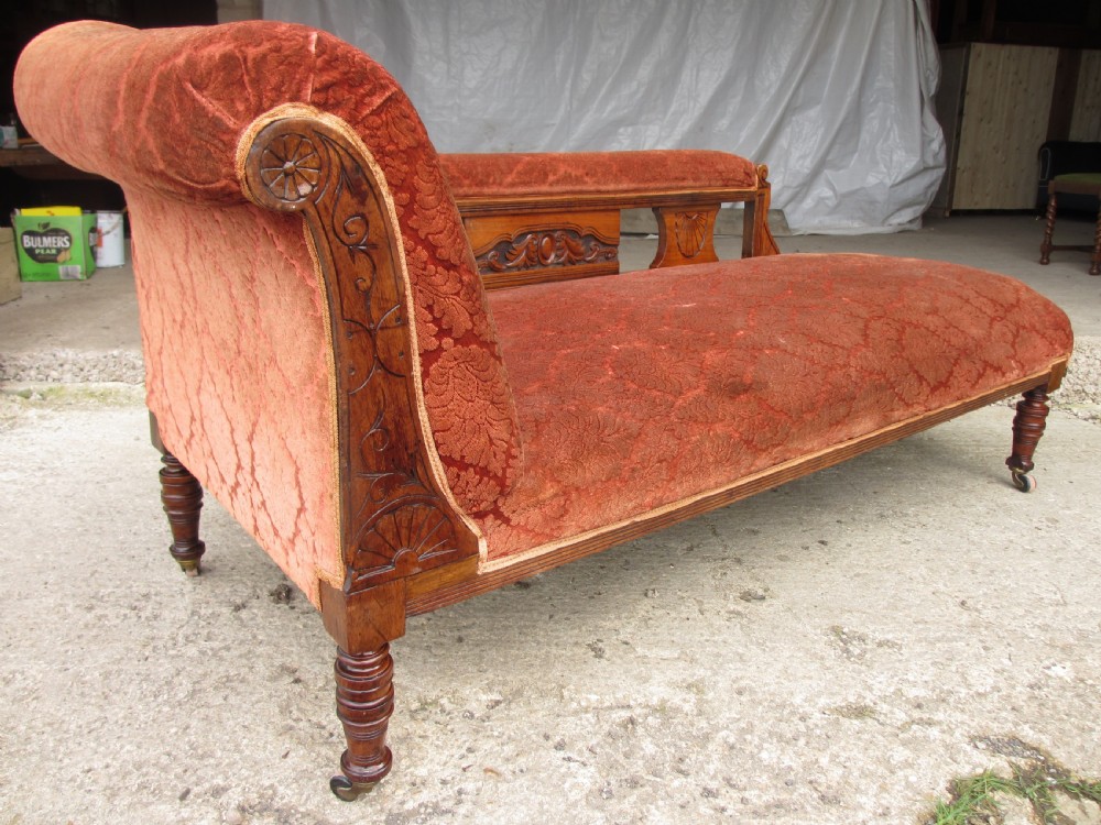 Victorian carved mahogany upholstered chaise longue View III