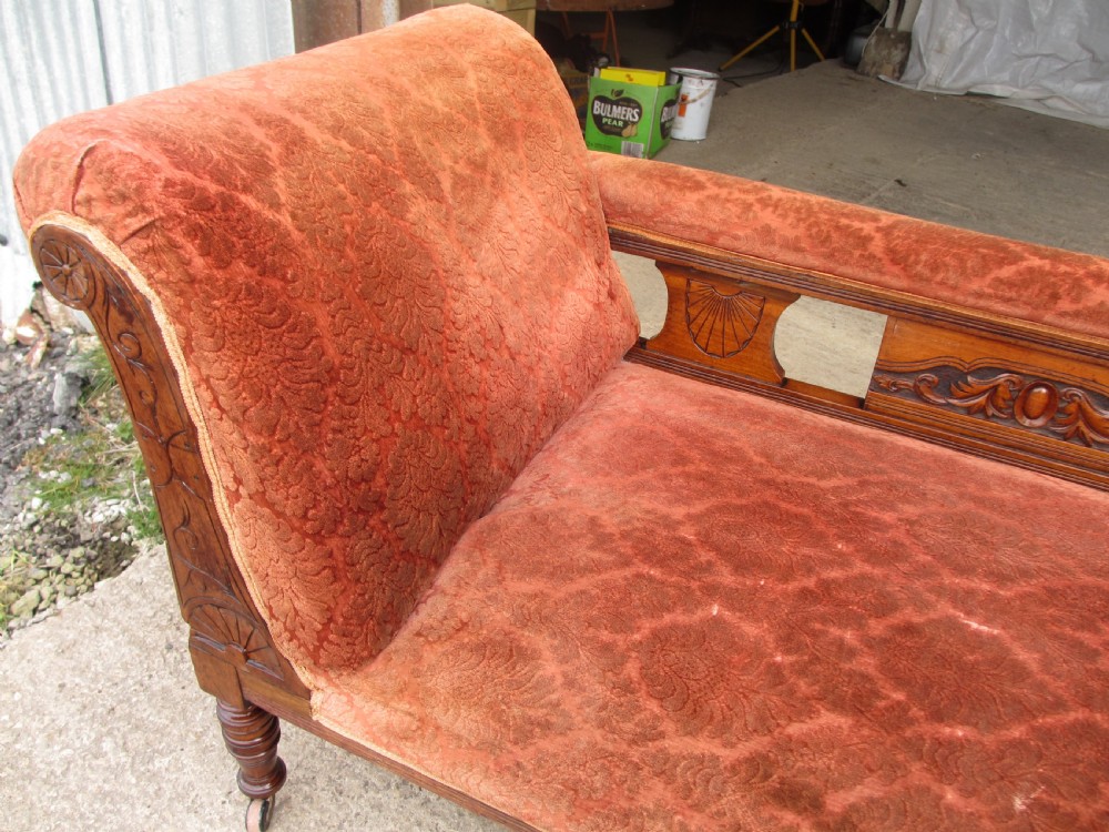 Victorian carved mahogany upholstered chaise longue View IX