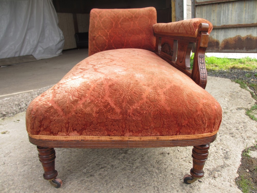 Victorian carved mahogany upholstered chaise longue View X