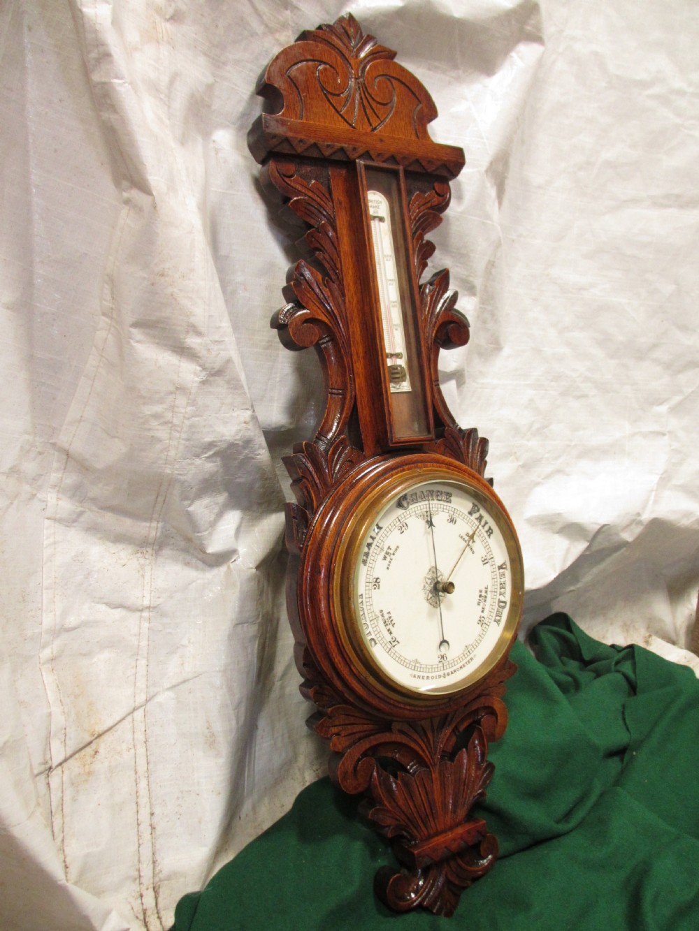 Lovely Victorian carved Oak wheel barometer by Brannon London  View II