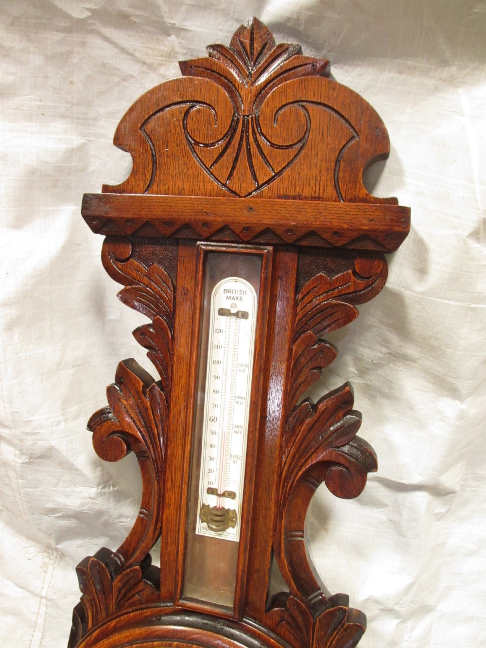 Lovely Victorian carved Oak wheel barometer by Brannon London  View III