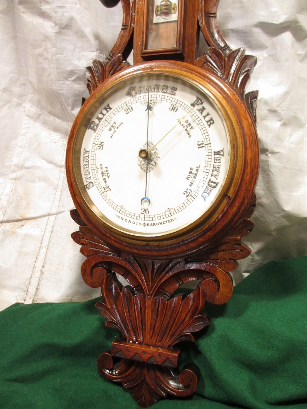 Lovely Victorian carved Oak wheel barometer by Brannon London  View IV