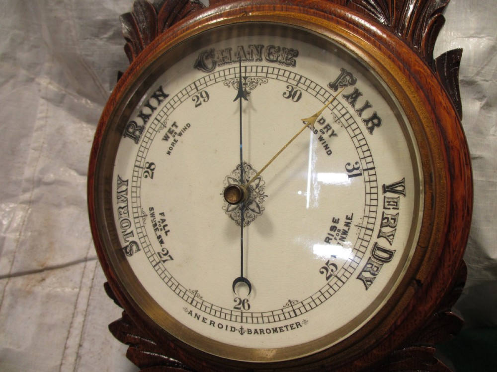 Lovely Victorian carved Oak wheel barometer by Brannon London  View VI