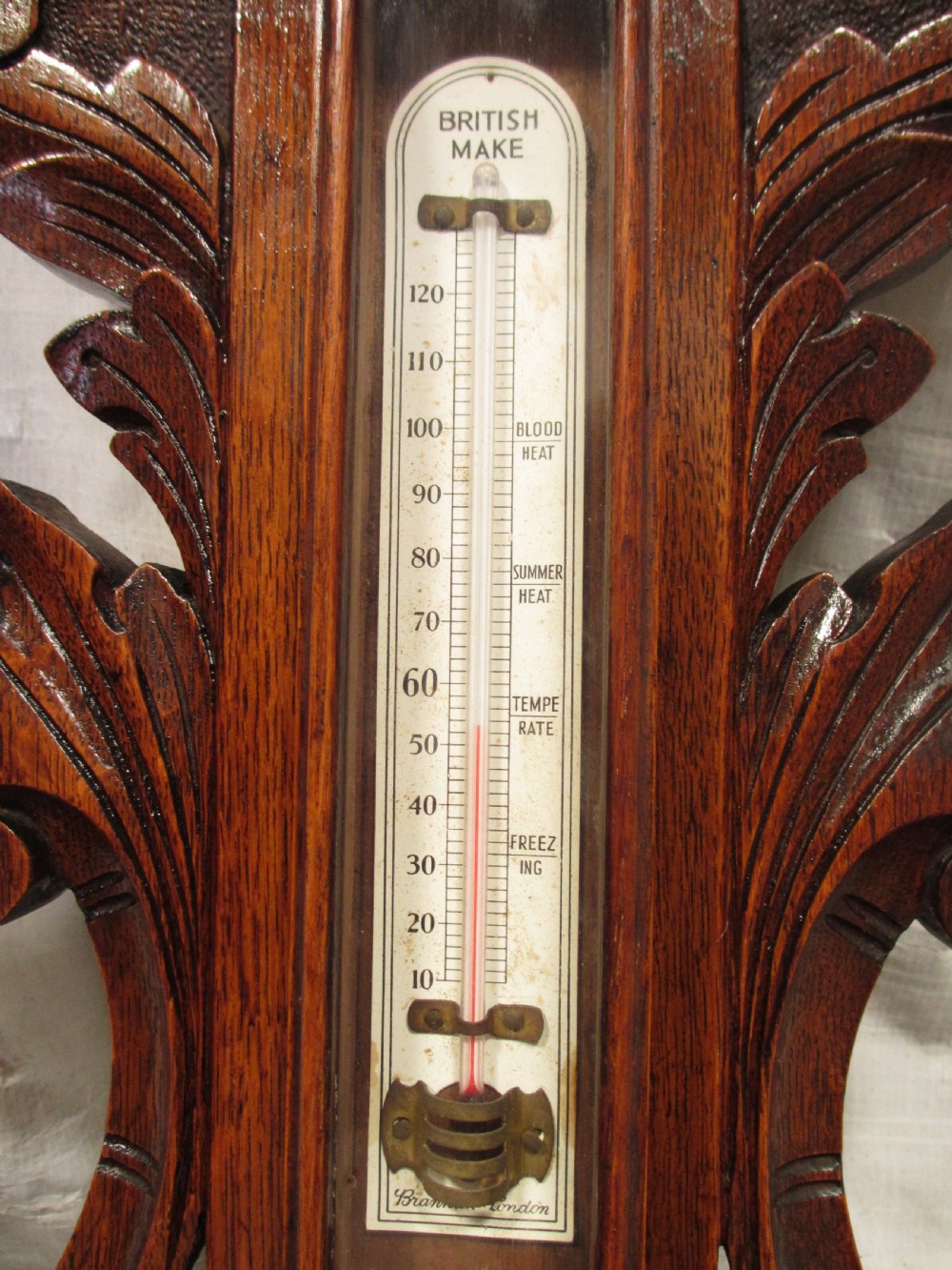Lovely Victorian carved Oak wheel barometer by Brannon London  View X