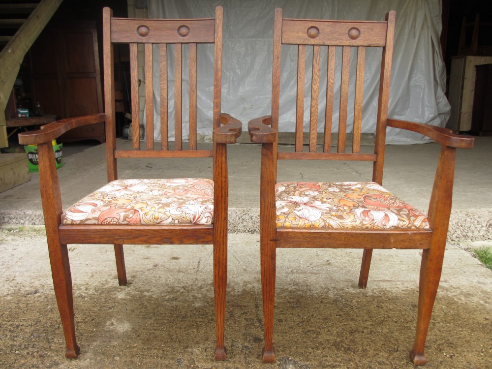 Pair of Victorian Arts and Crafts Oak carver arm chairs