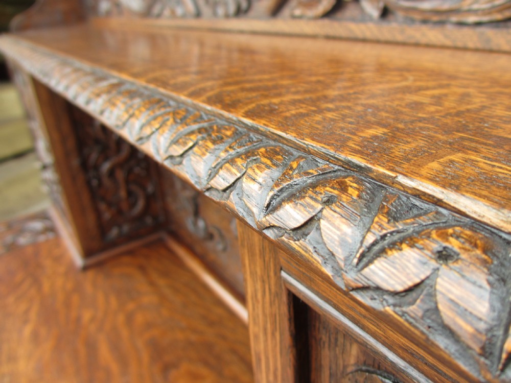 Unusual Victorian serpentine carved Oak writing desk View V
