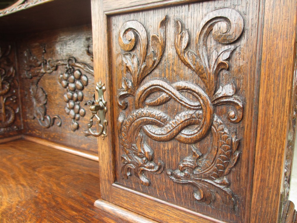 Unusual Victorian serpentine carved Oak writing desk View VI