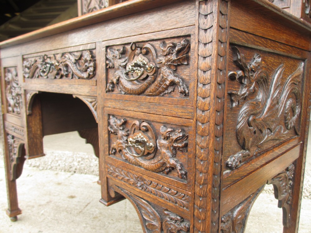 Unusual Victorian serpentine carved Oak writing desk View VIII