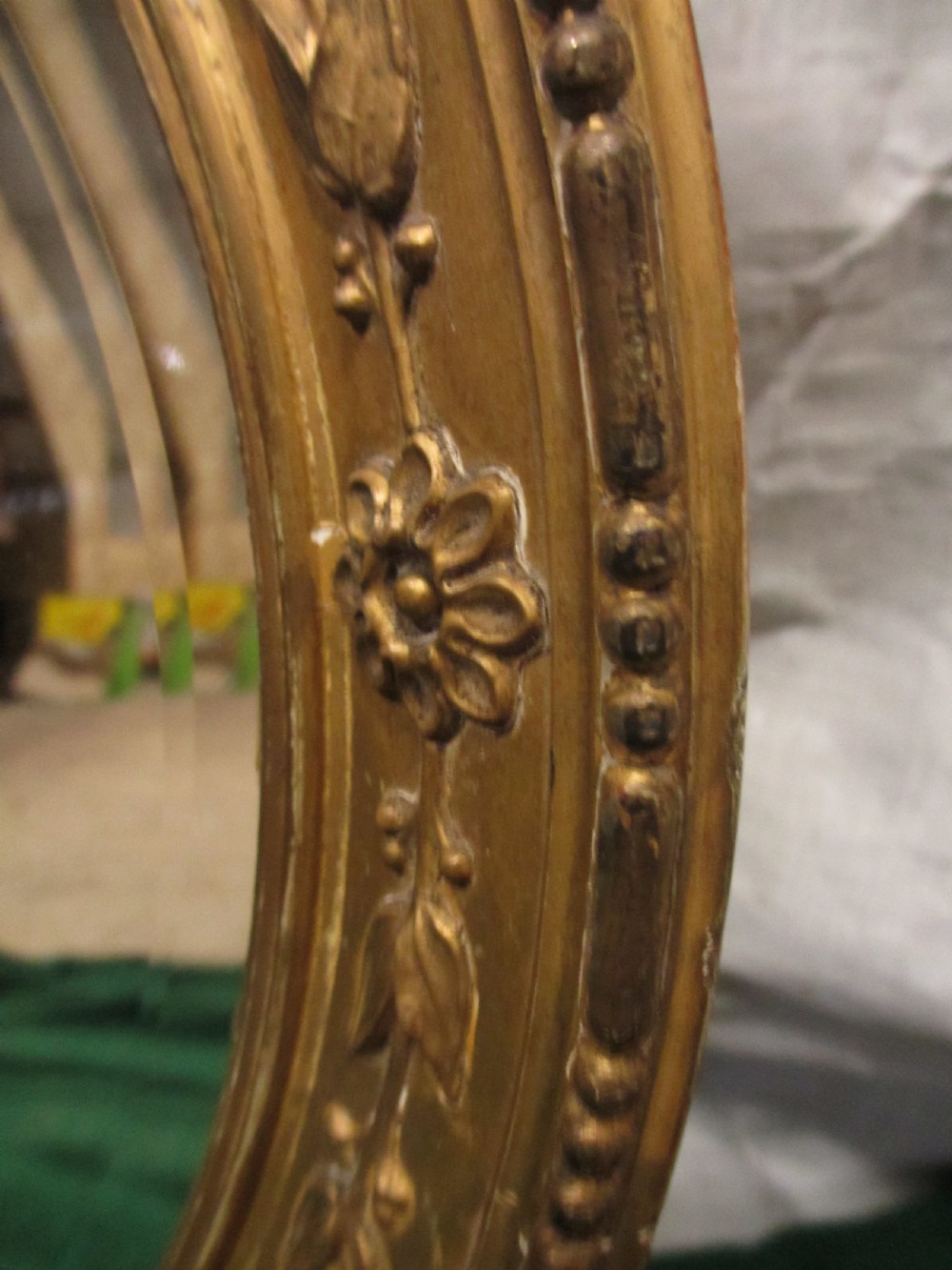 Early 19th century oval gilt framed bevel edged mirror View VI