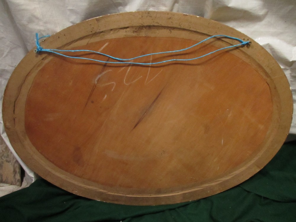 Early 19th century oval gilt framed bevel edged mirror View X