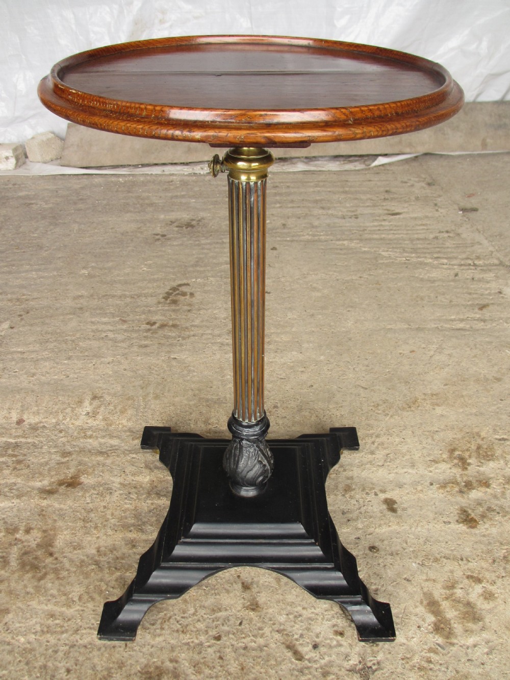 Victorian brass adjustable stand with oak circular pie edged top