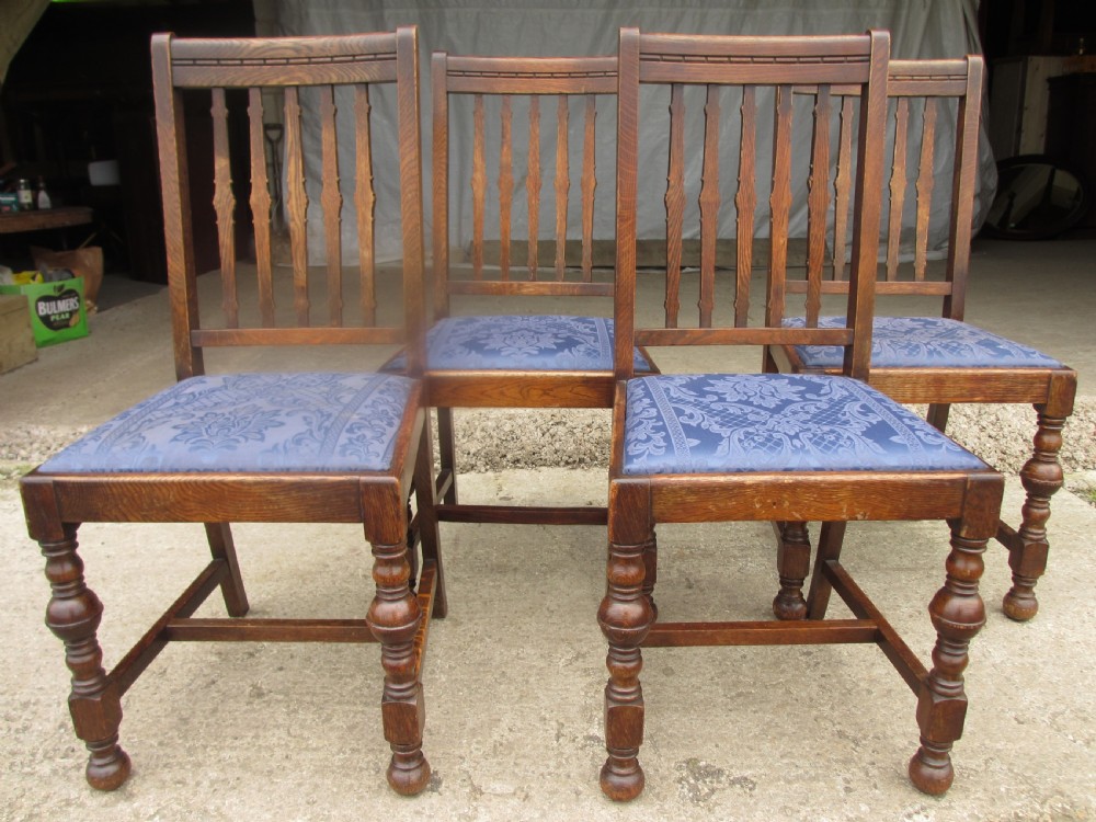 Four late 19th century oak slat back dining chairs  View II