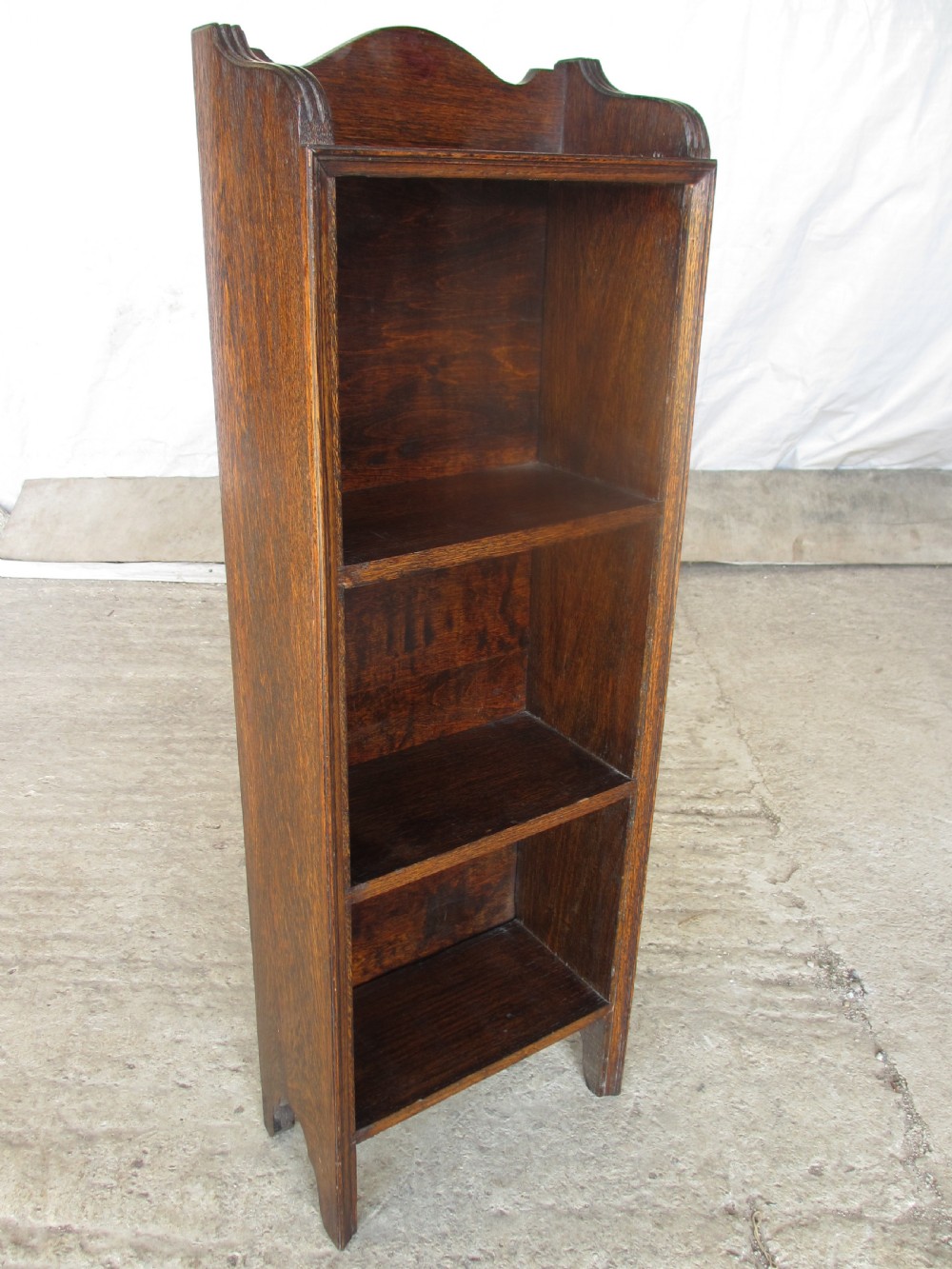 Edwardian slender oak bookcase with fifteen volumes of Dickens View II