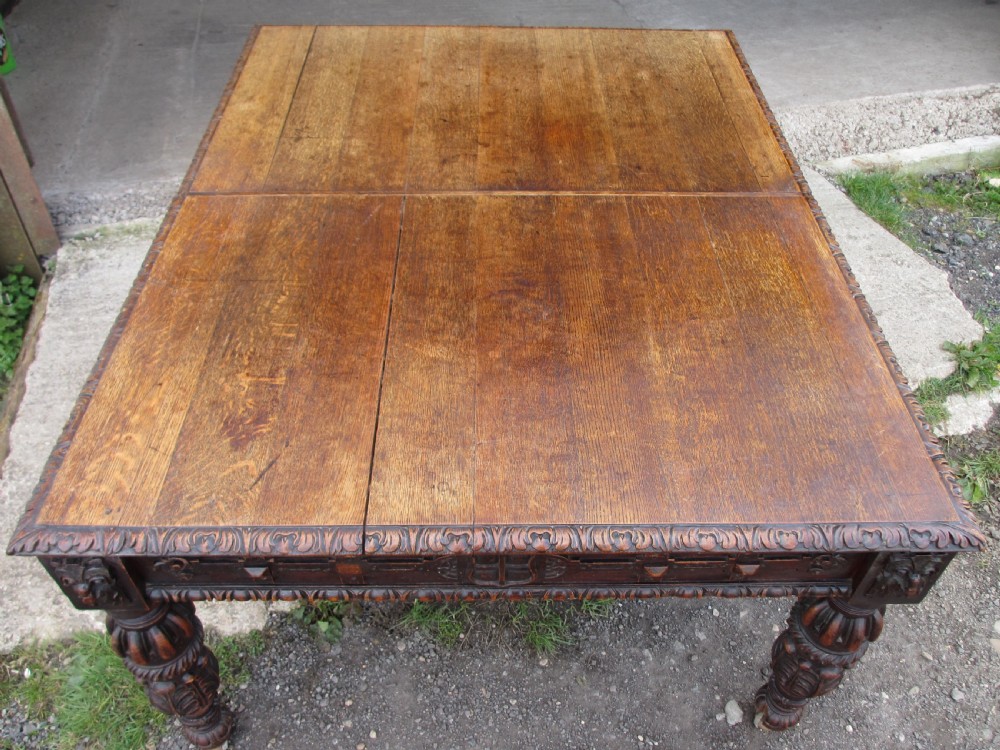 Victorian oak heavily carved partner's library desk  View XIII