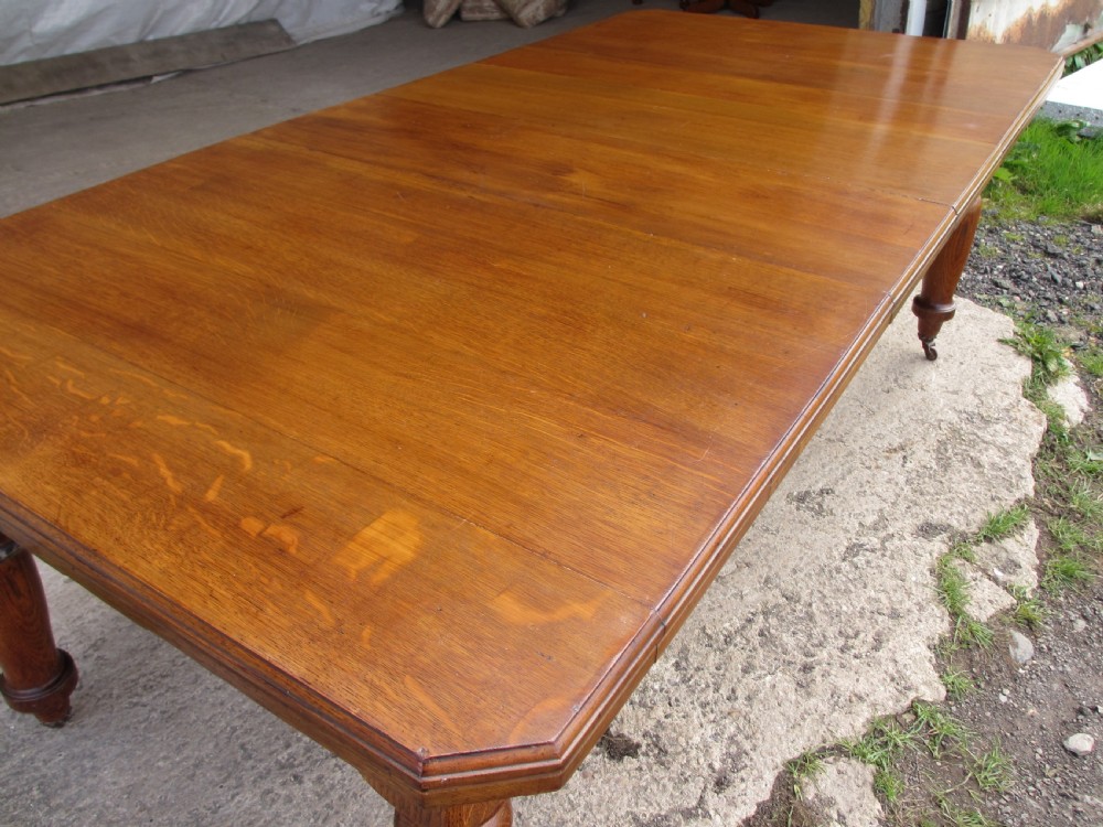 Victorian golden oak wind out extending dining table View III