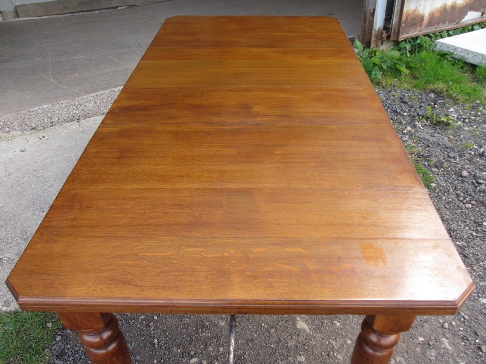 Victorian golden oak wind out extending dining table View VIII