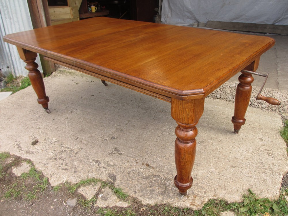 Victorian golden oak wind out extending dining table View XII