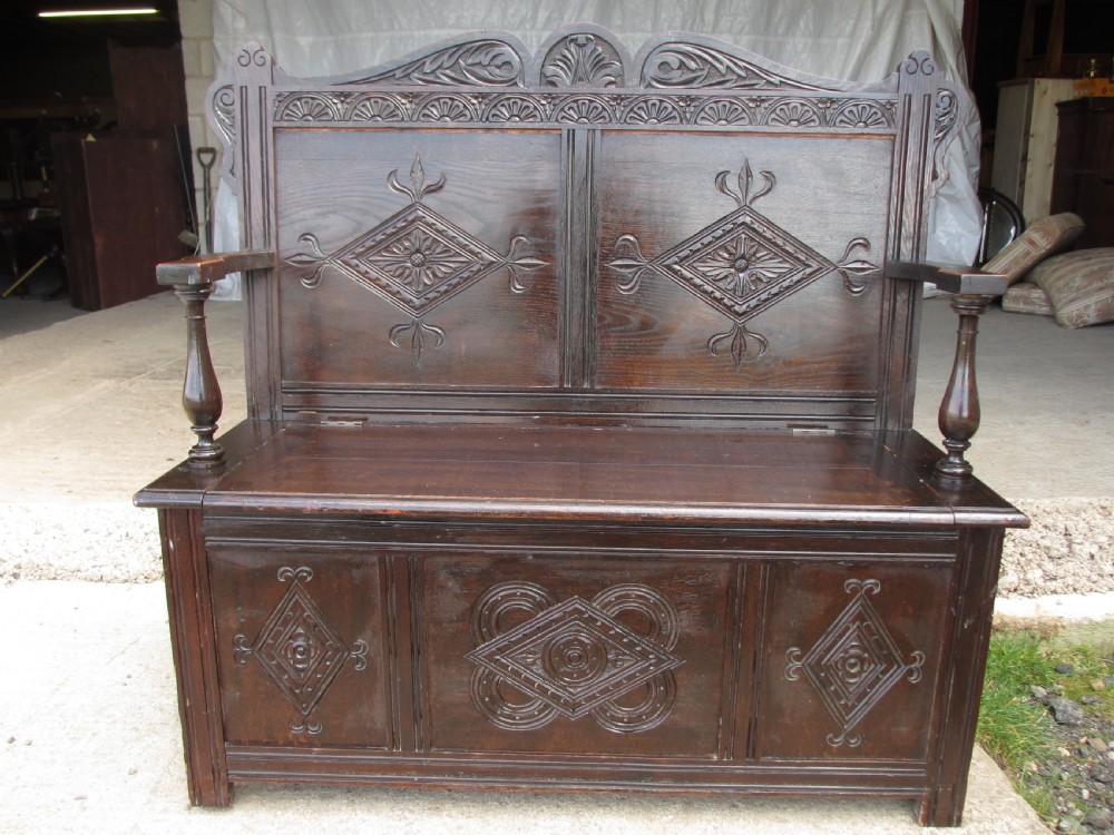 Victorian carved oak storage settle