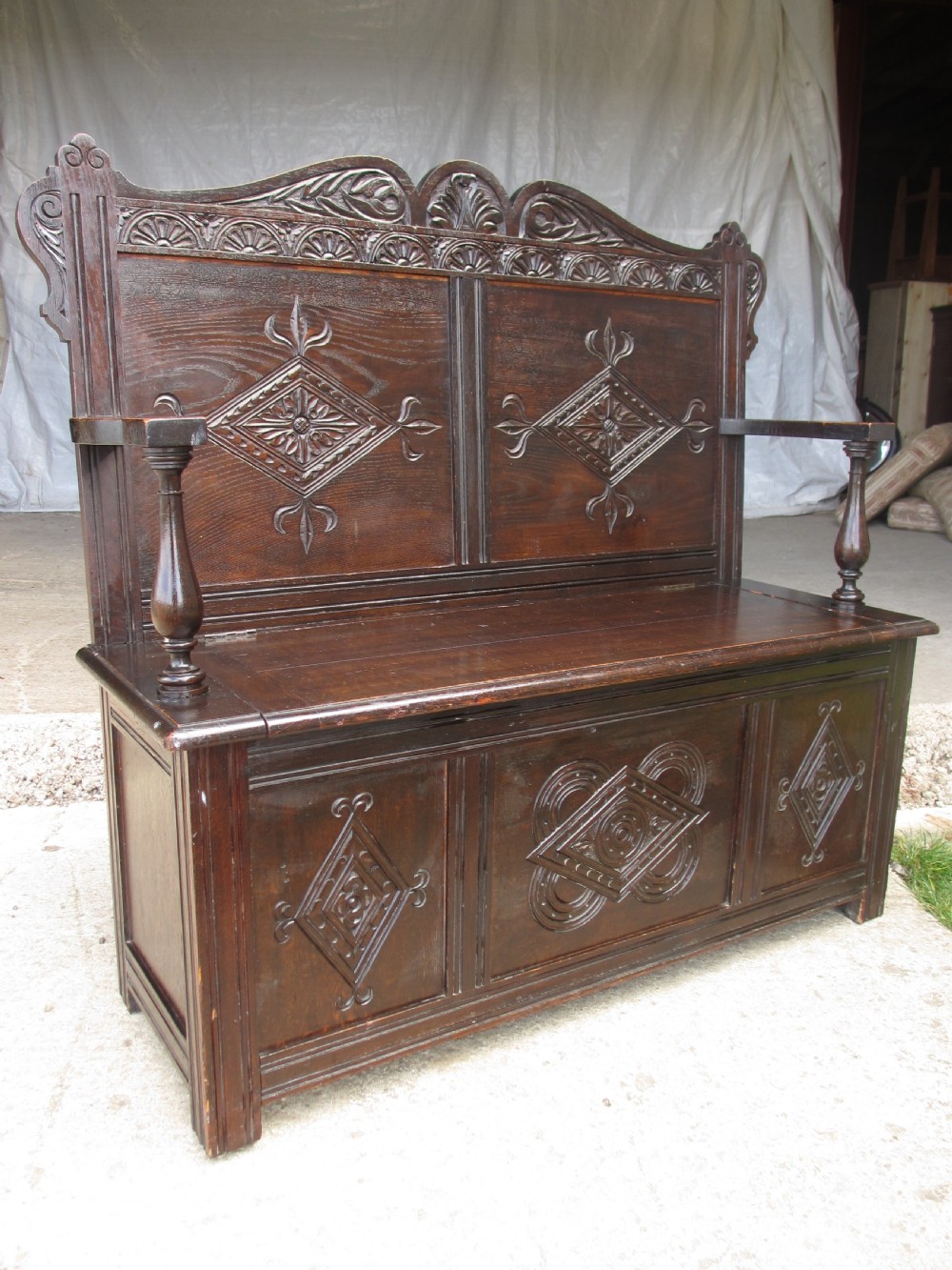 Victorian carved oak storage settle View II