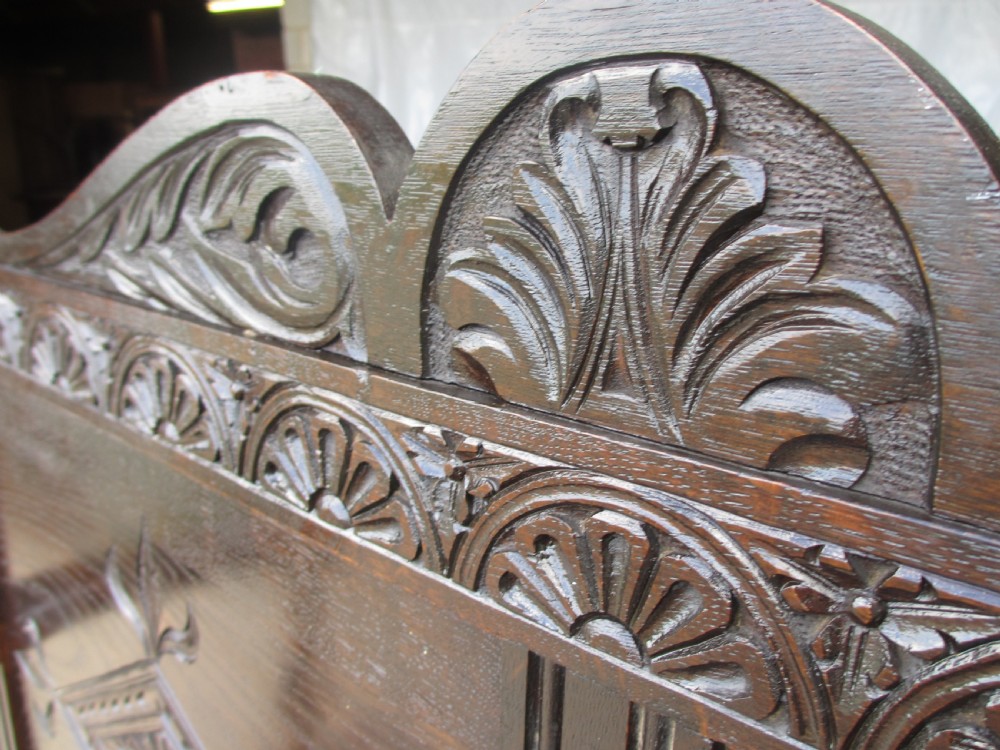 Victorian carved oak storage settle View VII