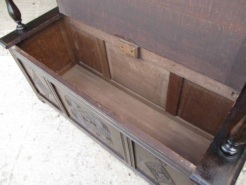 Victorian carved oak storage settle View IX