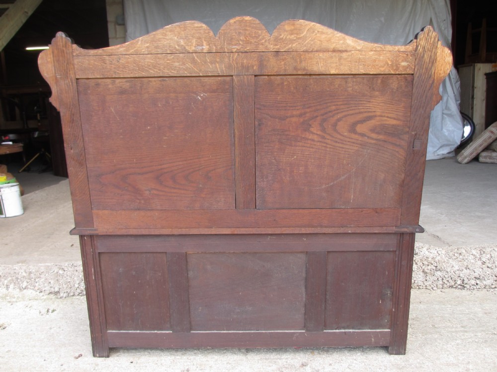 Victorian carved oak storage settle View XI