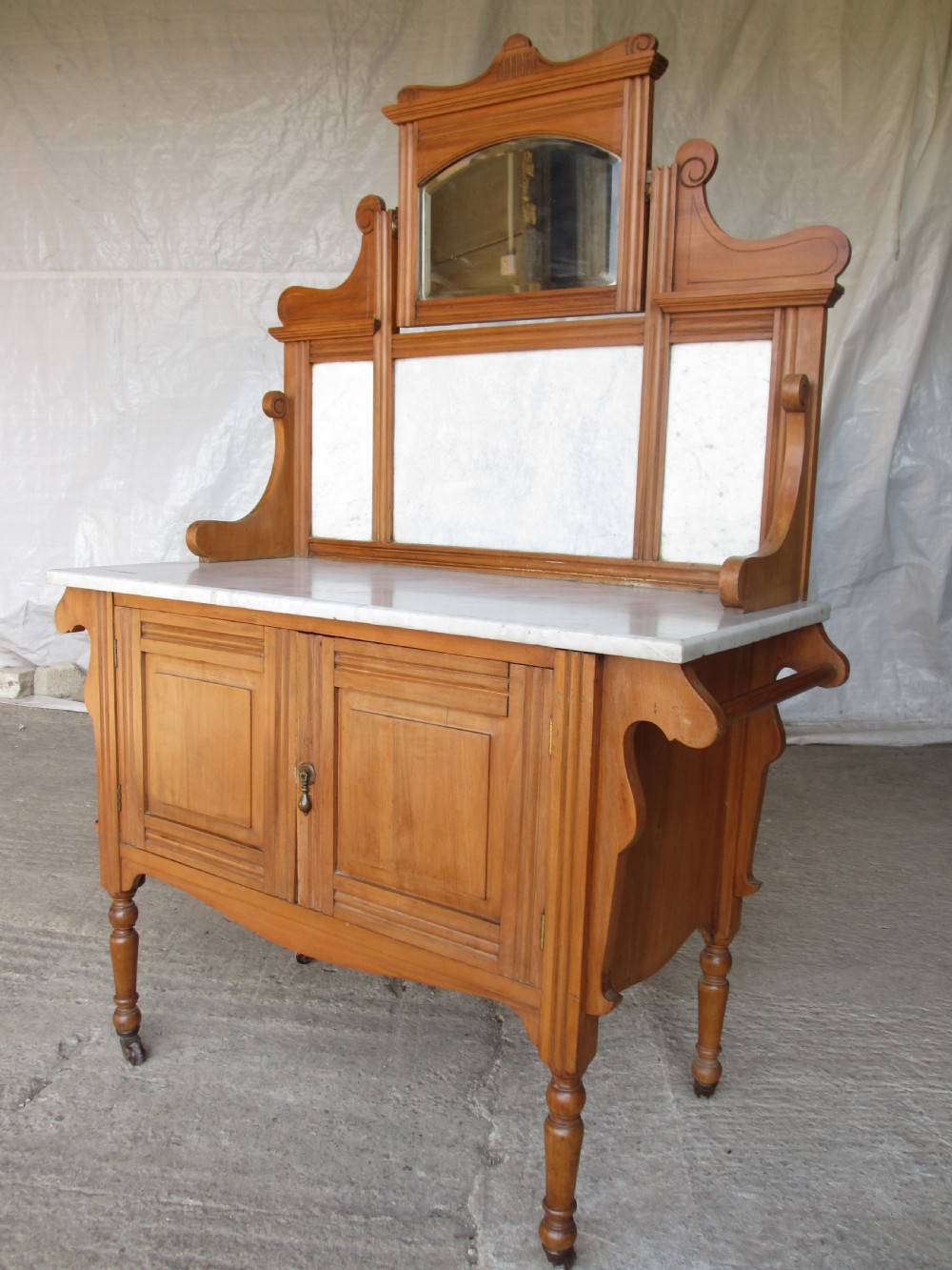 Victorian satinwood washstand with mirrored and marble back
