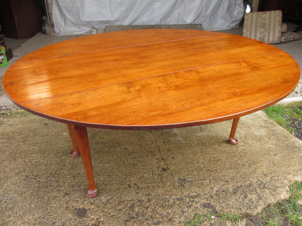 19th century mahogany drop leaf oval wake table  View II