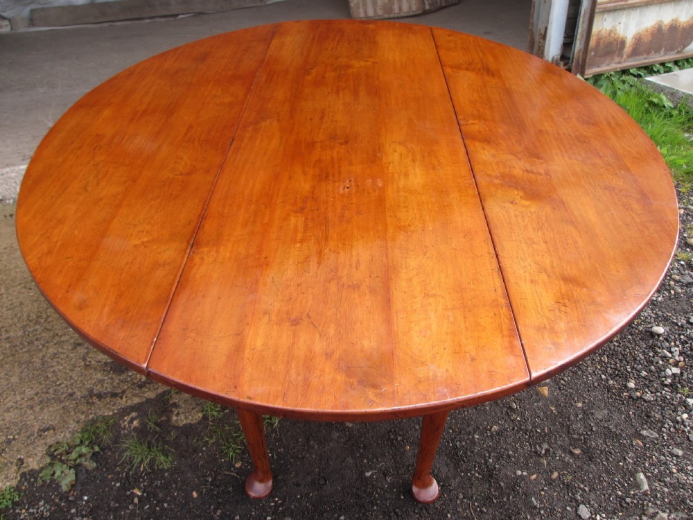 19th century mahogany drop leaf oval wake table  View IV