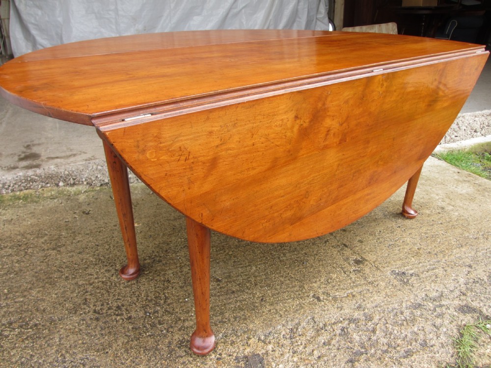 19th century mahogany drop leaf oval wake table  View VII