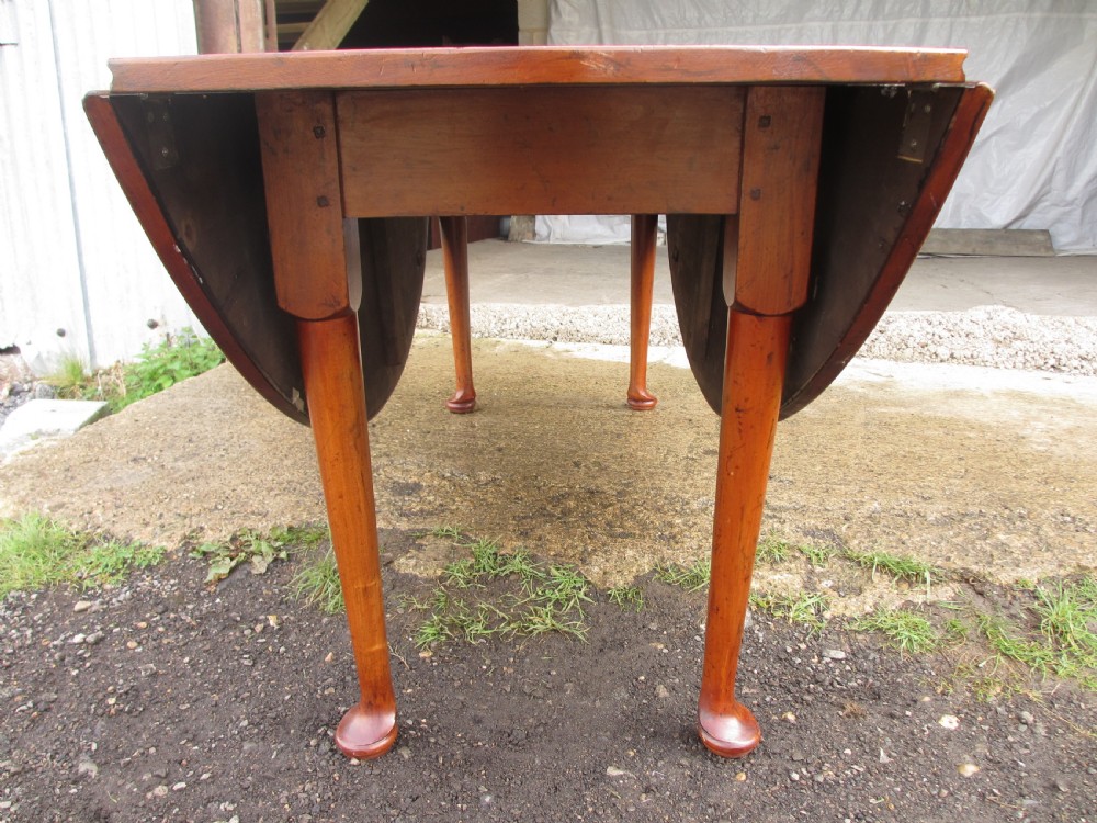 19th century mahogany drop leaf oval wake table  View XII