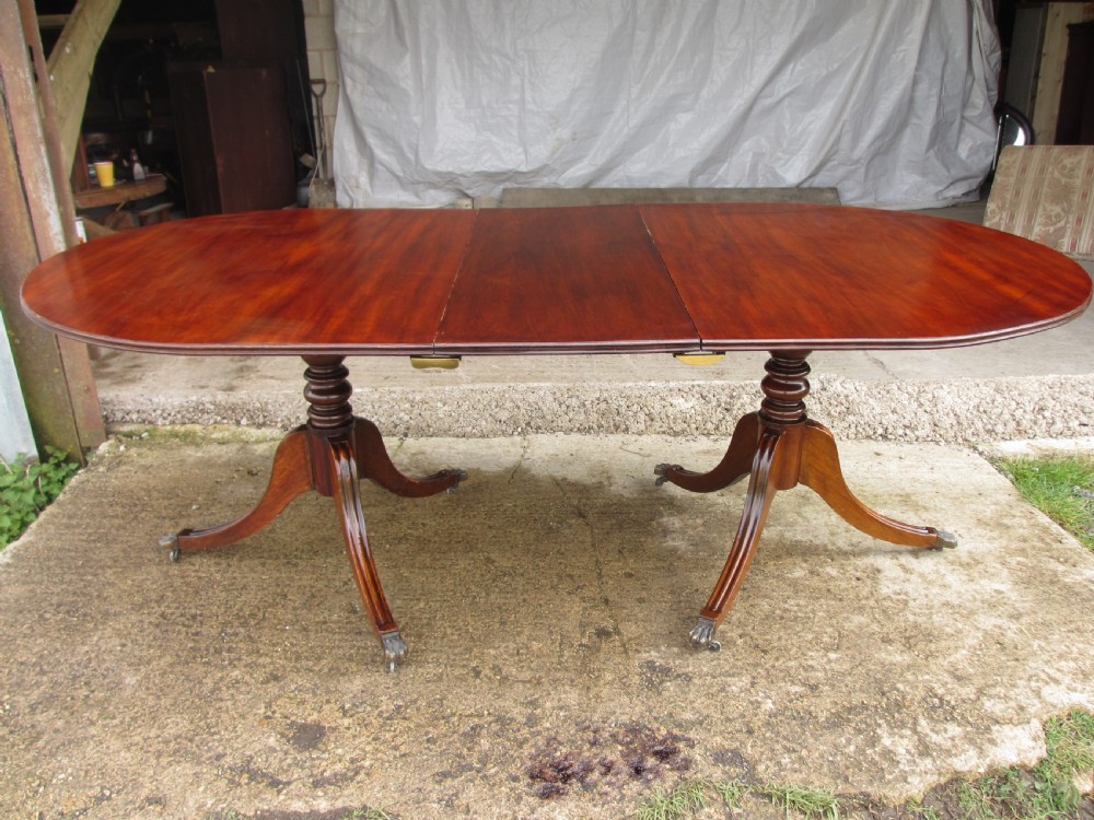 Early 20th century Regency style mahogany pedestal d-end dining table