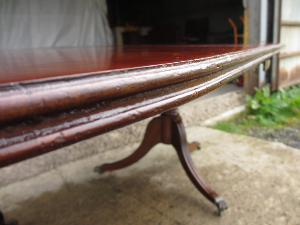 Early 20th century Regency style mahogany pedestal d-end dining table View V