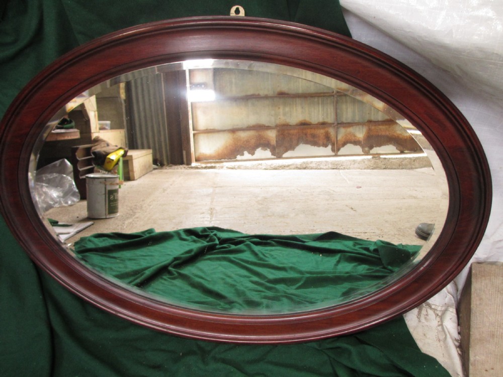 Late 19th century mahogany oval bevel glass mirror View II