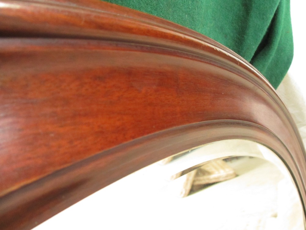 Late 19th century mahogany oval bevel glass mirror View IV