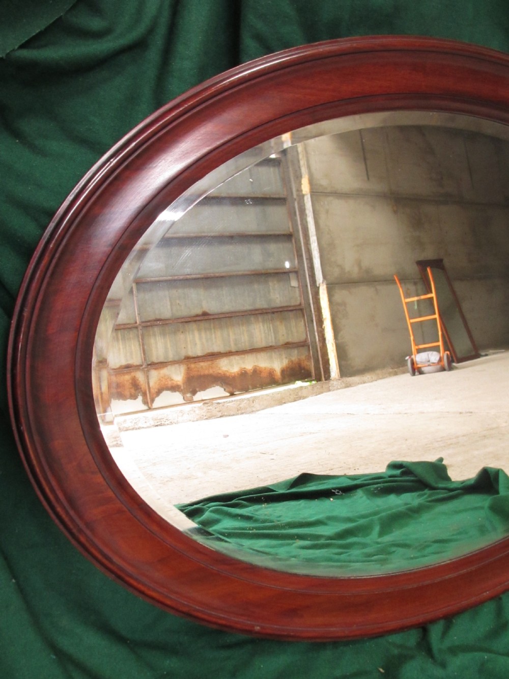 Late 19th century mahogany oval bevel glass mirror View VII