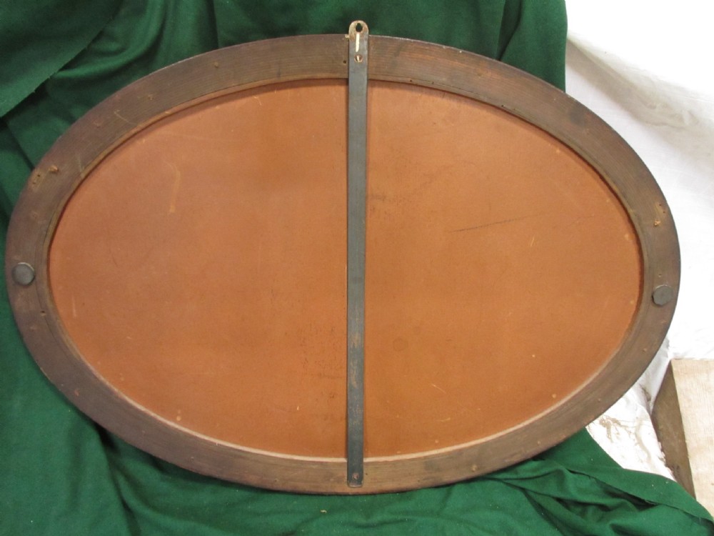 Late 19th century mahogany oval bevel glass mirror View X