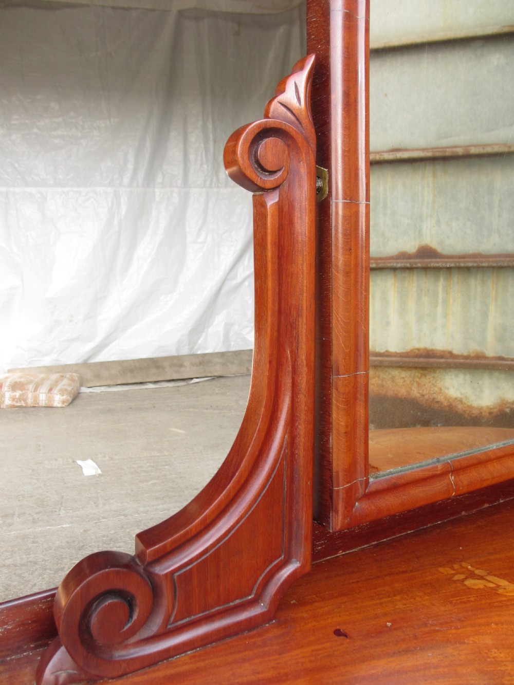 Victorian mahogany demi-lune dressing table featuring an arched swing mirror flanked by scrolled supports and a central carved cabriole front leg. View VI